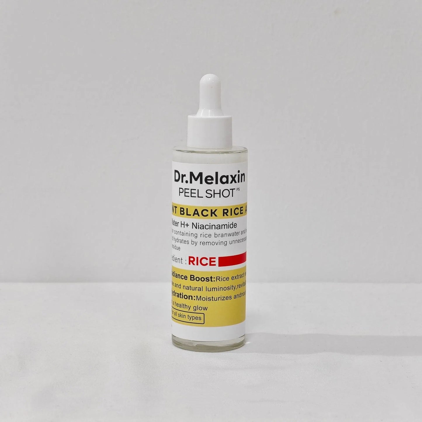 White and black rice peeling essence