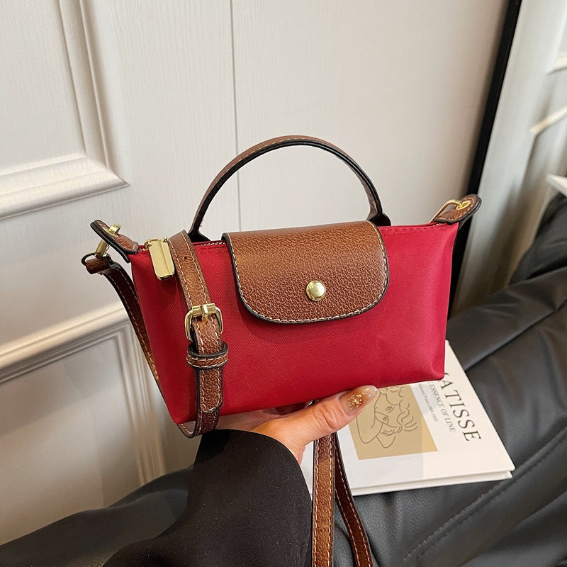 2025 Women's Mini Dumpling Handbag. Made of high - end nylon. Stylish shoulder/crossbody phone bag.