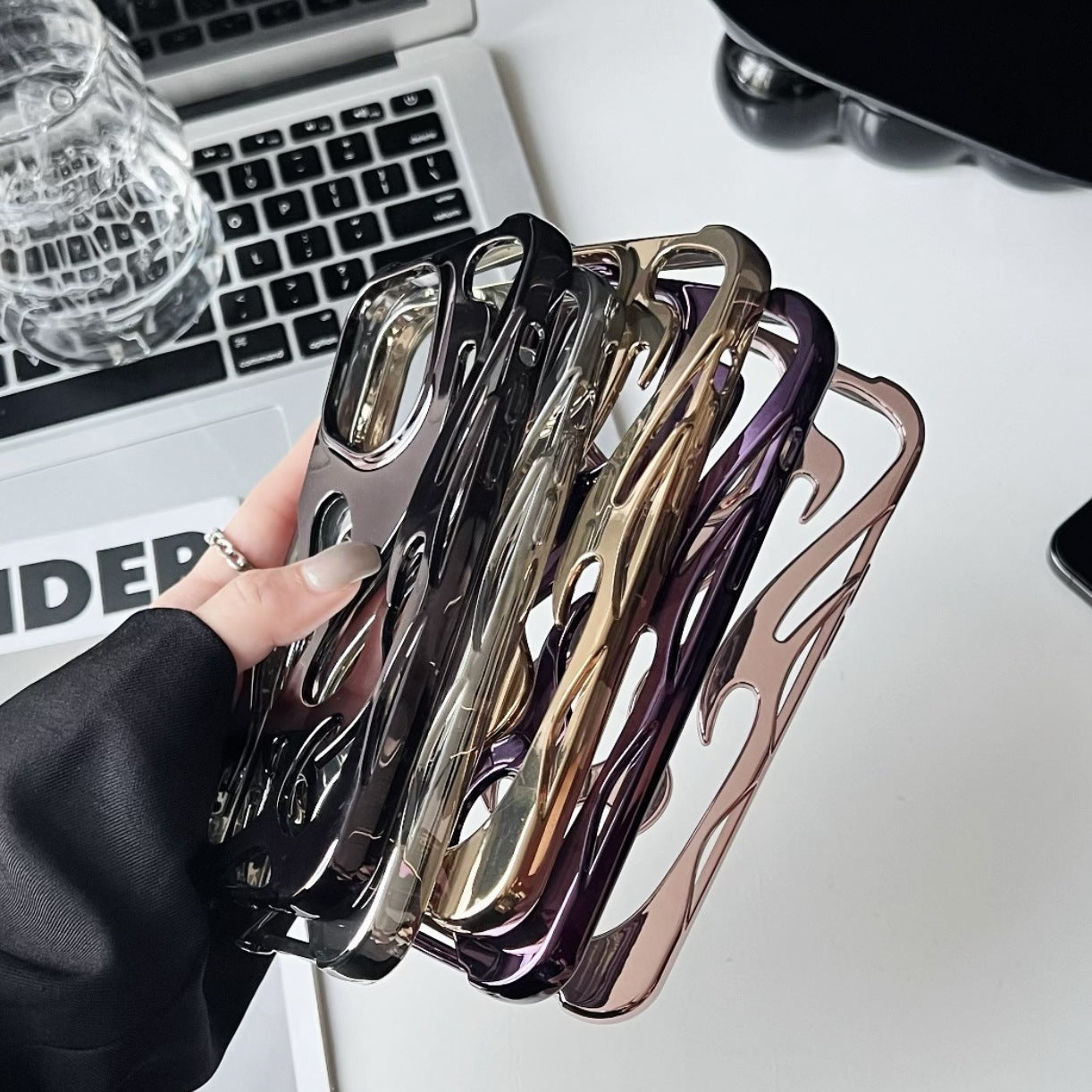 Electroplated hollow flame pattern phone case suitable for iPhone 15 Pro, simple all inclusive, Apple 14 anti drop protective cover