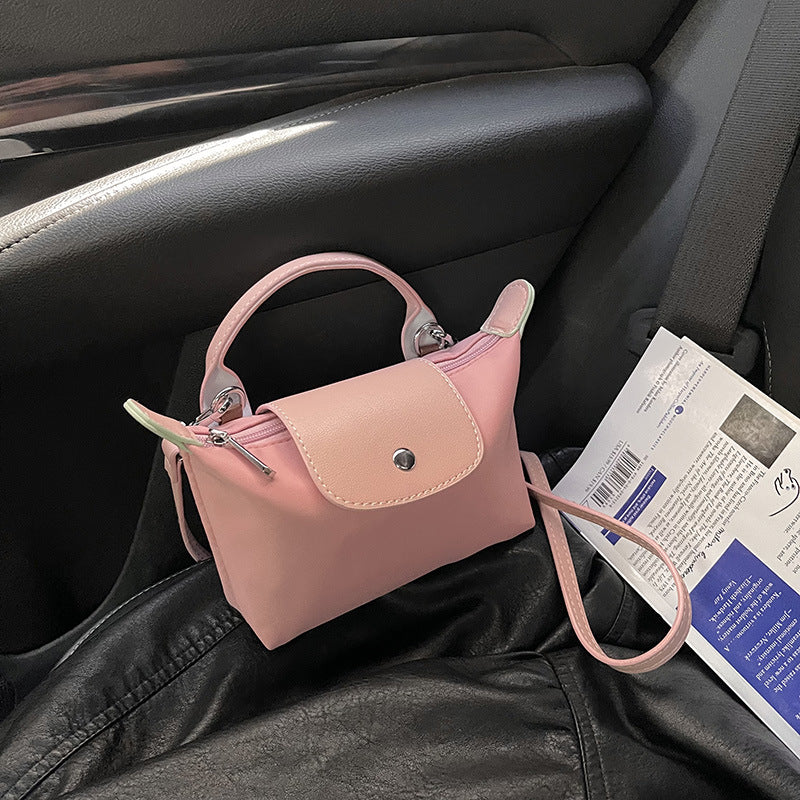 Retro fashion versatile women's bag, shoulder crossed, carrying high-end nylon dumpling bag